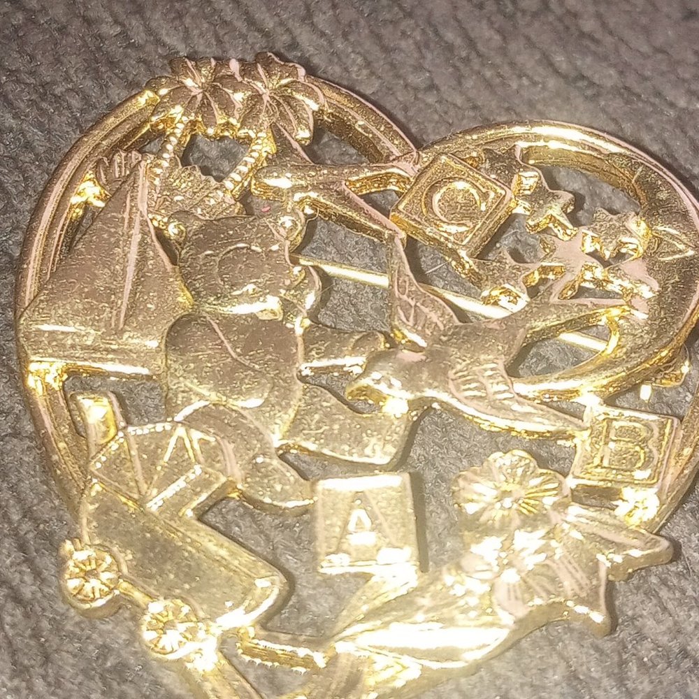 Avon brooch
